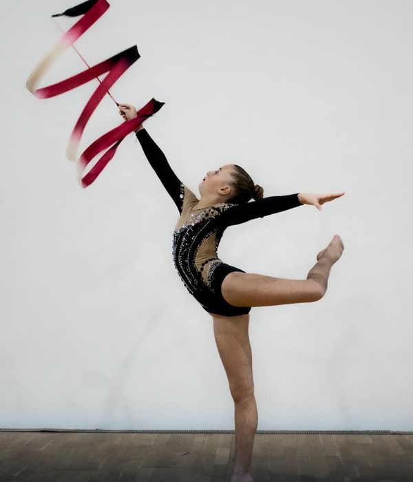 Man performing soft rhythmic movements in a modern room