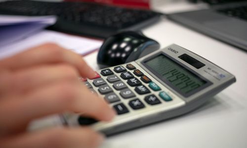 Person feeling relaxed at the office desk
